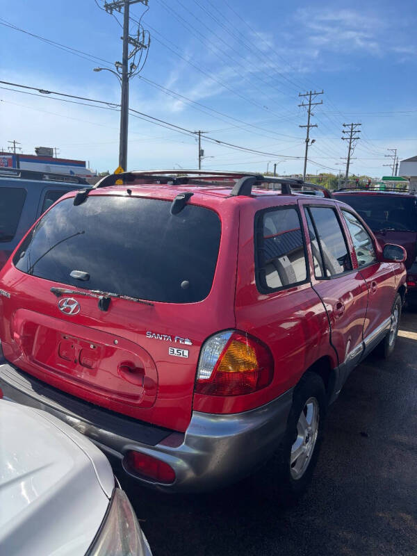 hyundai santa fe 2004 KM8SC13E54U850374 image hyundai santa fe 2004 KM8SC13E54U850374 image